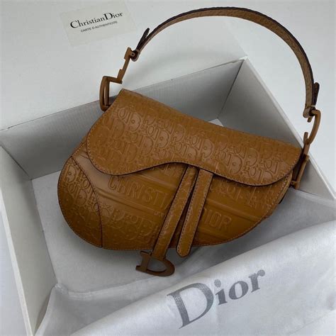 dior saddle embossed|Dior saddle clothing.